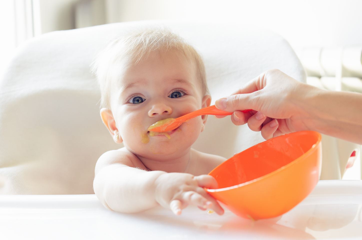 baby eating baby food